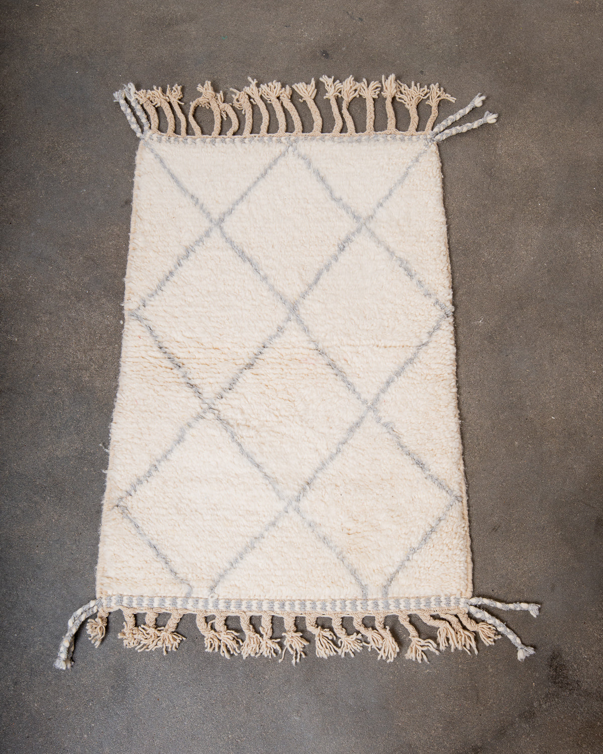 Modern, designer, handcrafted Berber rug from Morocco. Beniourain carpet with beautiful colours and patterns and fluffy wool texture.